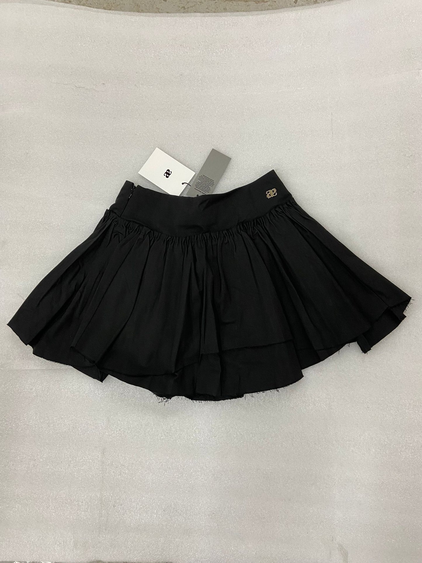 Double A logo tag pleated skirt